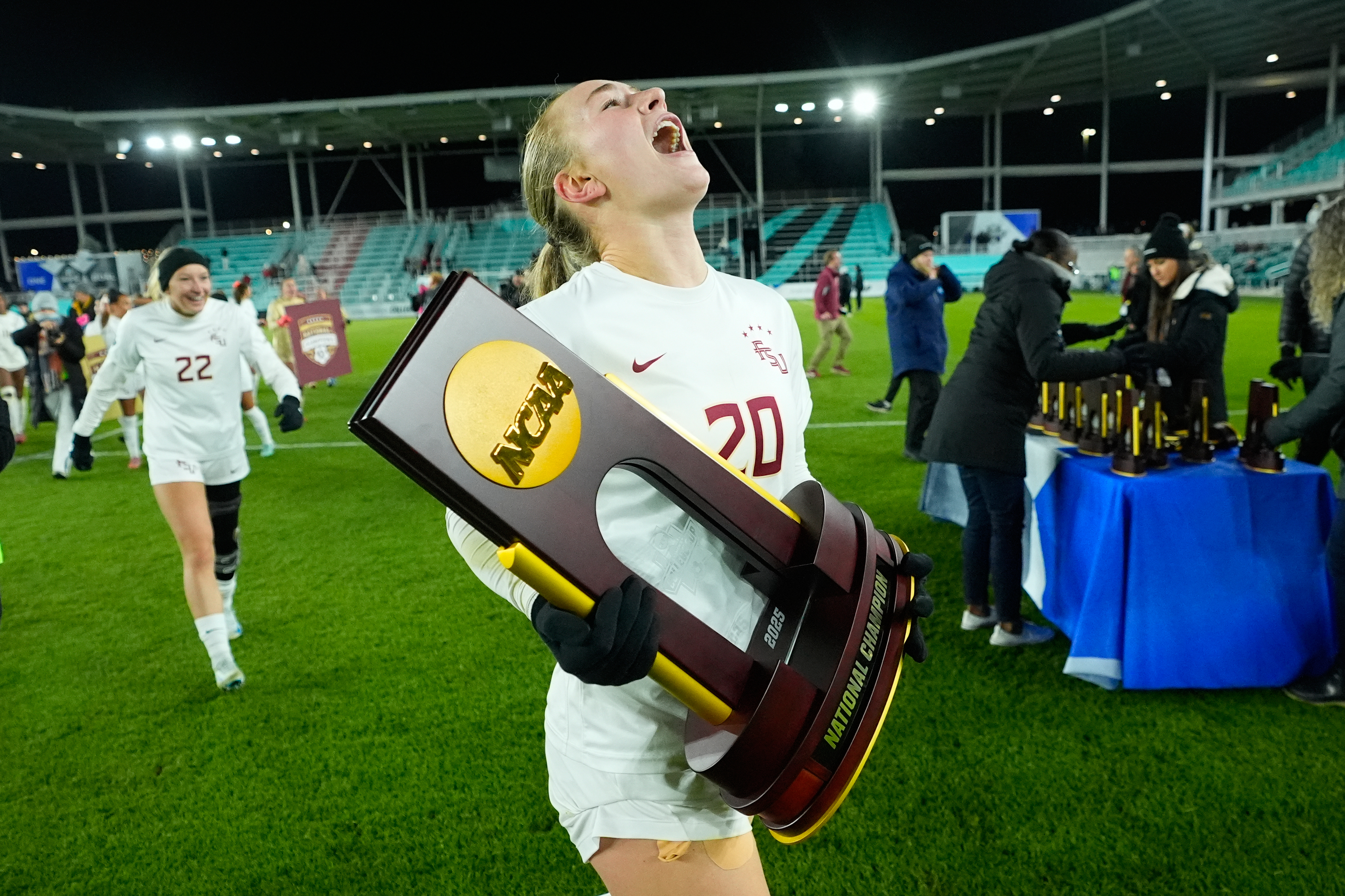 Heather Gilchrist celebrates Florida State's victory over Stanford in the NCAA college soccer tournament final Monday, Dec. 8, 2025, in Kansas City, Mo. (AP Photo/Charlie Riedel)