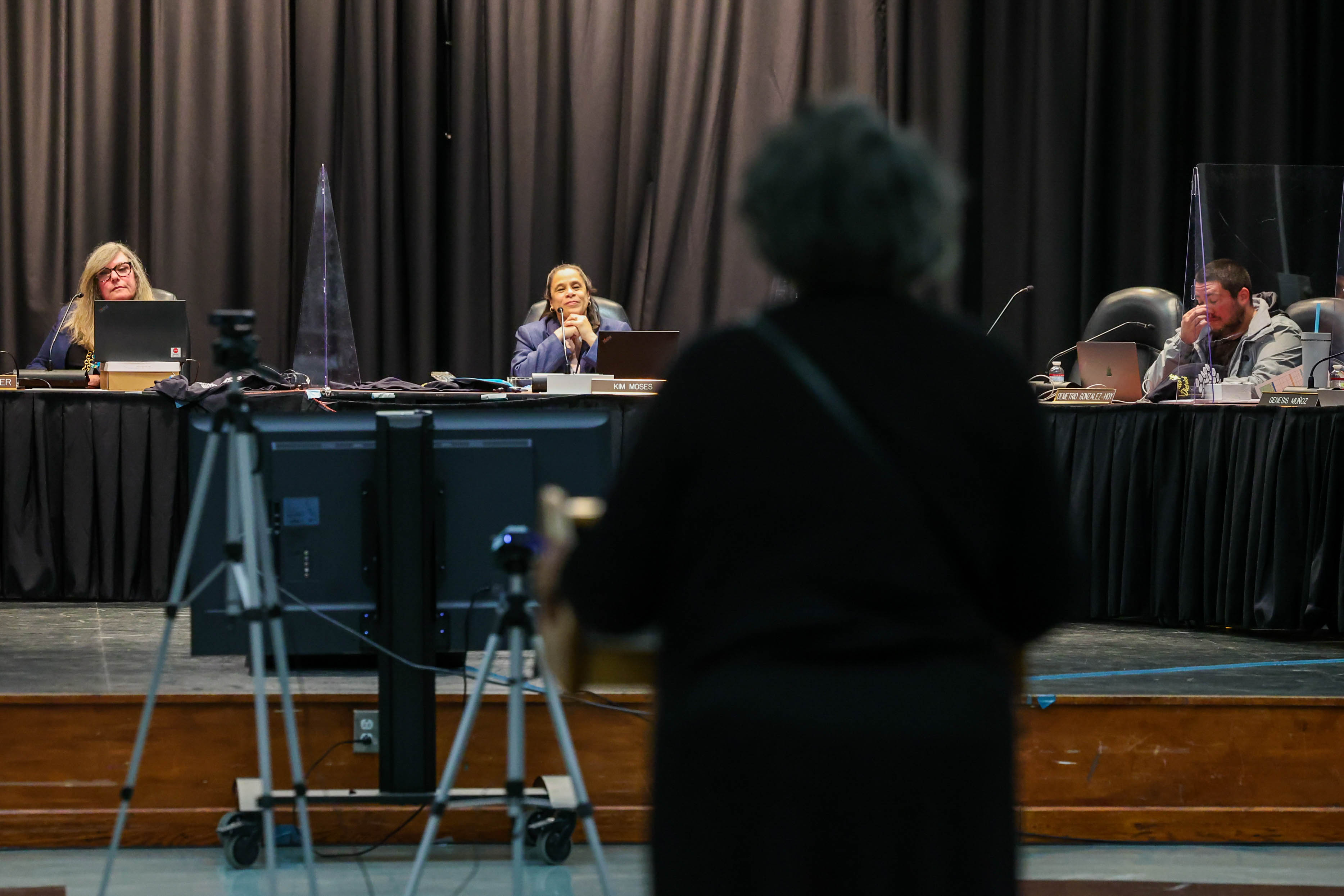 A person speaks during a West Contra Costa Unified School District meeting on budget cuts at Lovonya DeJean Middle School in Richmond, Calif., on Wednesday, Feb. 26, 2025. The district says it needs to make severe cuts to remain fiscally solvent. Teachers say the cuts are going to harm students and are unnecessary. (Ray Chavez/Bay Area News Group)